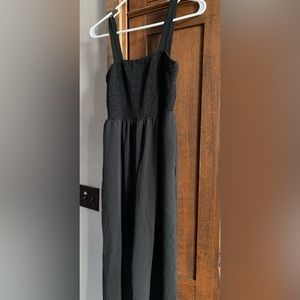 Women size small, one piece black suit